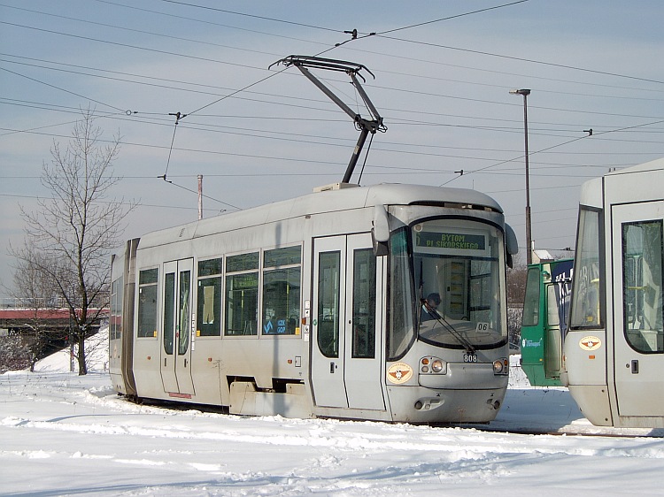image of modern tram Silesian Interurban, Poland, winter snowy scene